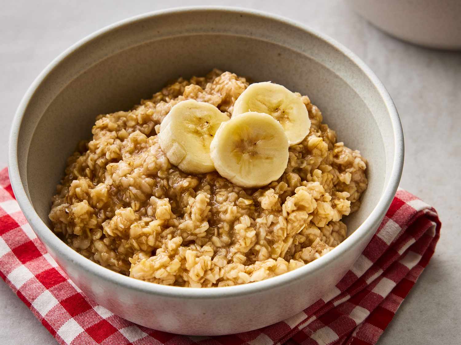 A bowl filled with old-fashioned rolled oats