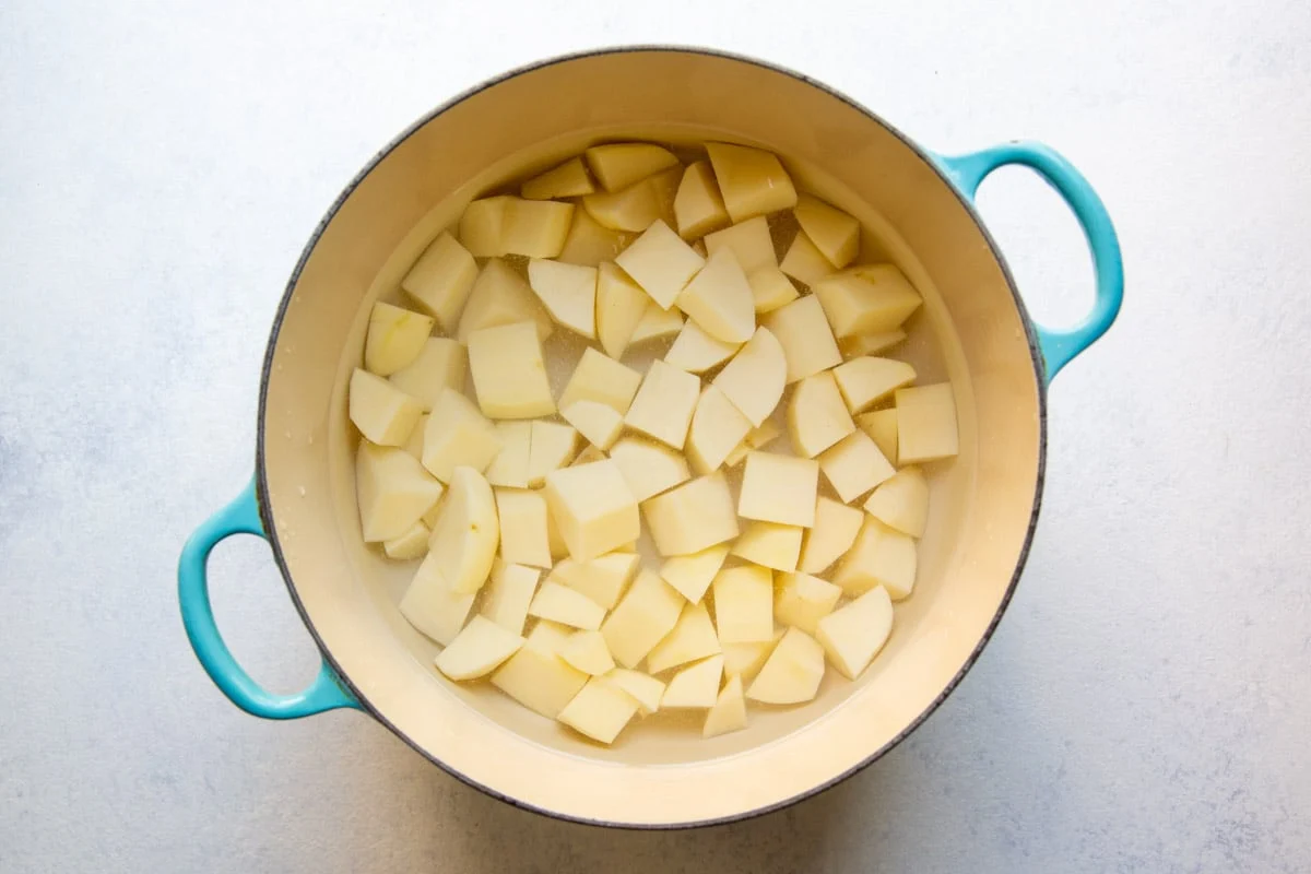 A bowl of diced boiled potatoes ready to be seasoned for chaat