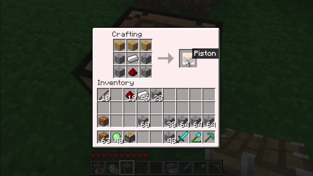 A neat Minecraft crafting setup on a wooden table with cobblestone, planks, an iron ingot, redstone dust, and a crafted piston placed beside the crafting grid