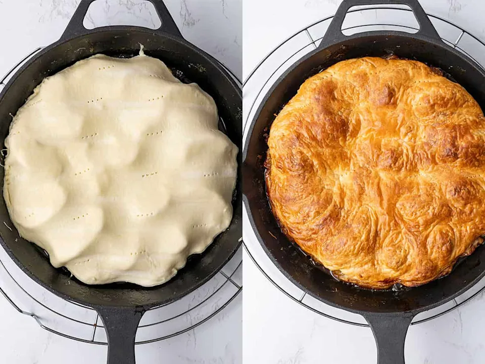 A round of puff pastry being laid over caramelized apples in a cast iron skillet, with the edges being tucked down around the fruit