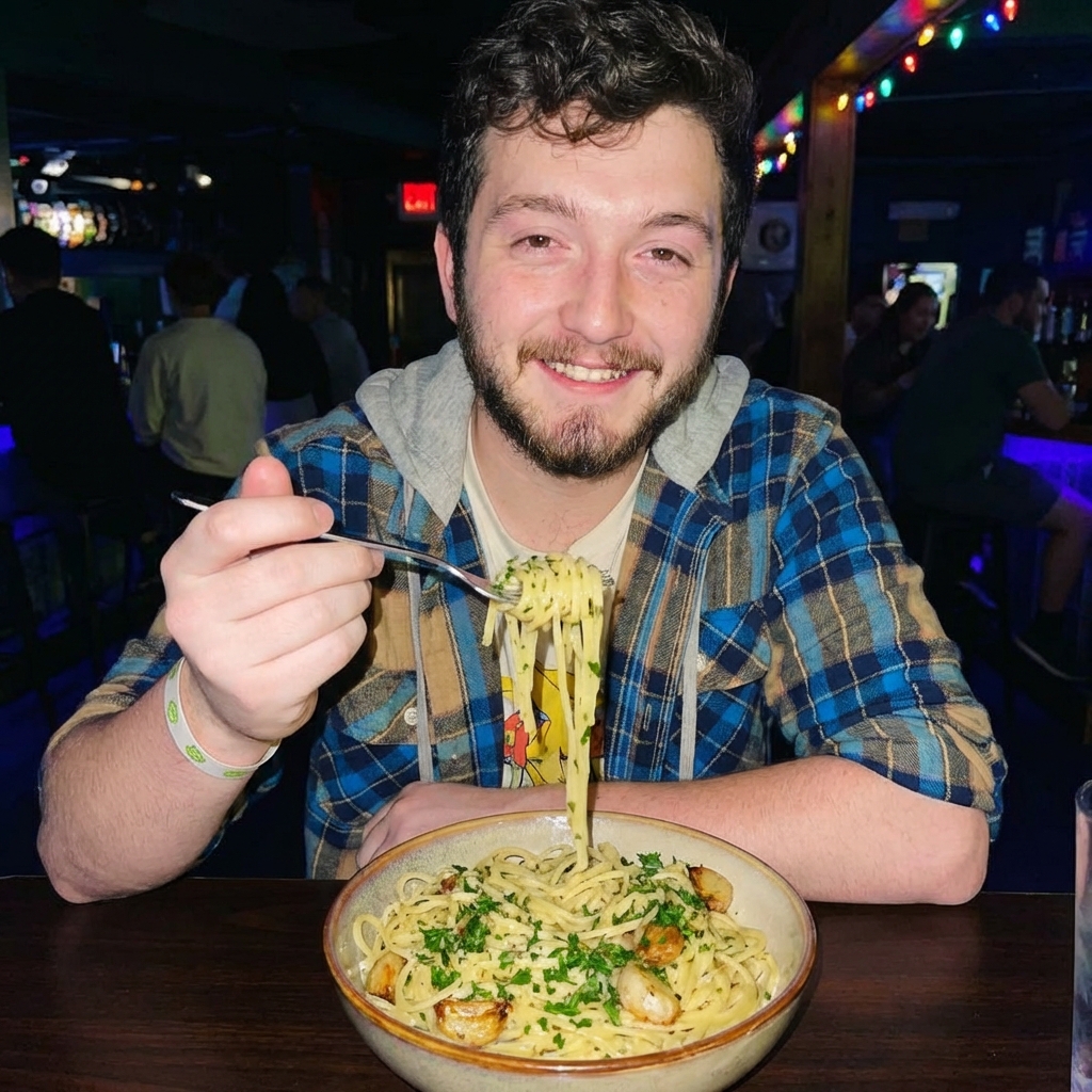 Garlic butter pasta in a bowl with parsley