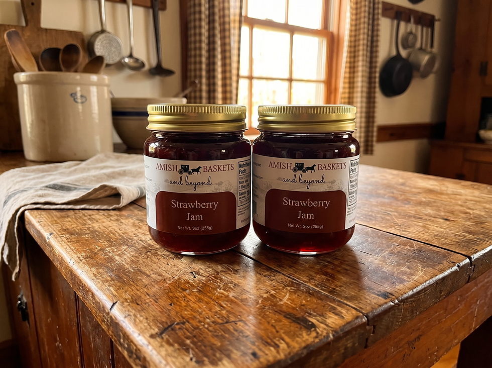Several small jars of strawberry freezer jam lined up on a kitchen counter while setting at room temperature