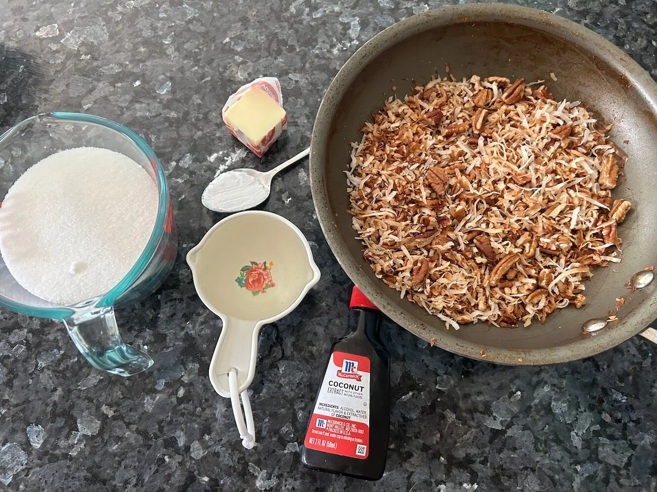 Toasted pecans and sweetened shredded coconut ready to be mixed into frosting